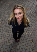 Parelketting op oranje draad met zilveren slot